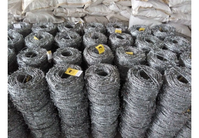 Ispezione della qualità delle materie prime Barbed wire raw material inspection — steel wire rod coils with mill test certificate and wire diameter measurement